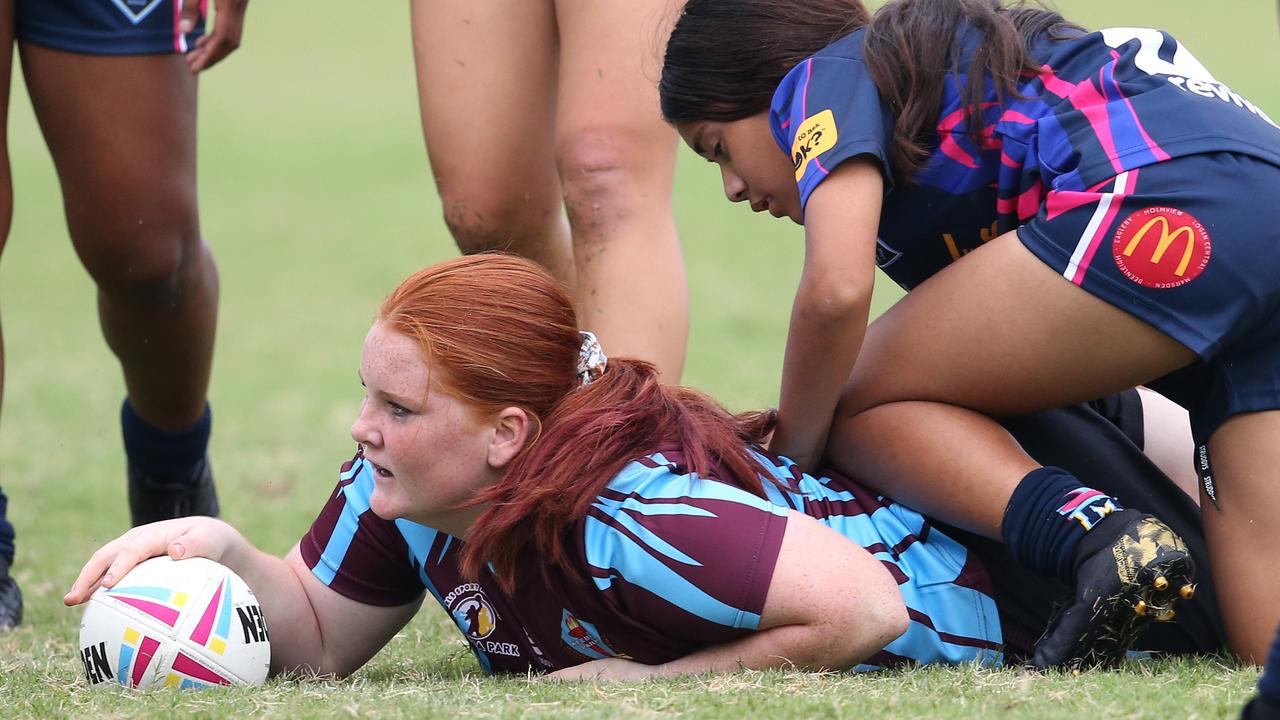 Titans Schools League at Burleigh Bears Junior Rugby League. Year 7/8 Division 1 girls: Keebra Park v Mabel Park. Keebra's Charlize Lewis scores. Picture Glenn Hampson