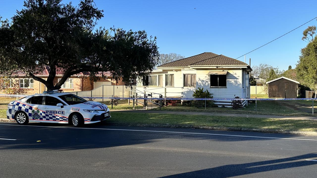 Police at the scene of a Harristown house fire, with a crime scene declared at the Glenvale Rd property.