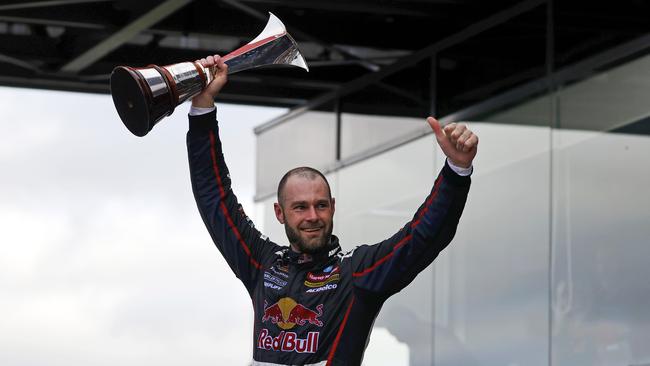 Shane Van Gisbergen celebrates after claiming the V8 Supercars Championship . Picture: Tim Hunter.