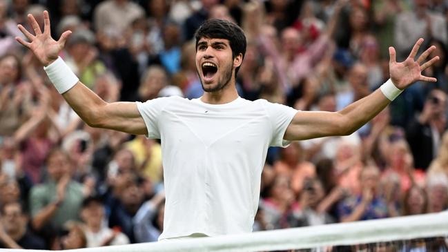 Alcaraz takes in the adulation of the crowd after a stunning forehand winner at the end of a 17-stroke rally sealed victory in straight sets and a place in the final. Picture: The Times