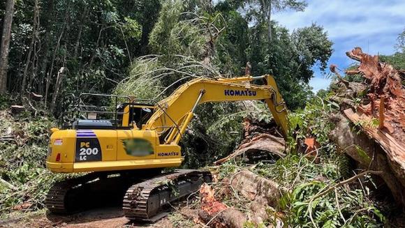 Work crews at the Palmerston Highway clear the roadway of vegetation and rock following major landslides in the wake of Ex Cyclone Jasper. Picture: Transport and Main Roads