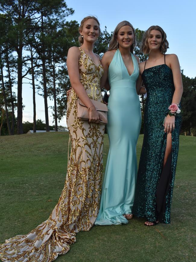 Mackenzie Smyth, Lara Feenaghty and Courtney Calvert at the Pioneer State High School formal at the Mackay Golf Course on Friday November 20. Picture: Zizi Averill