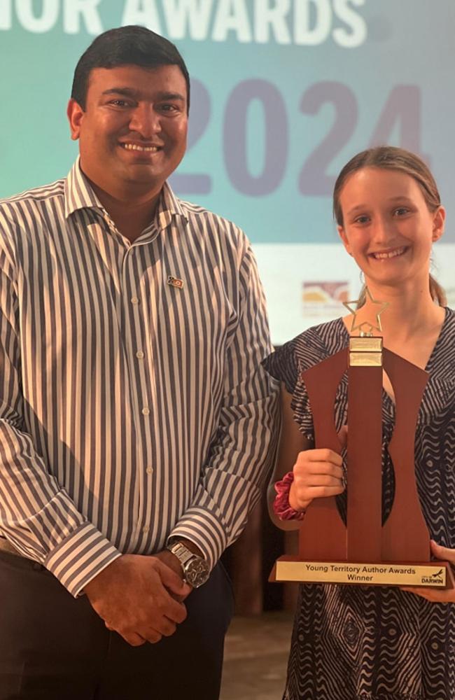 Young Territory Author Awards 2024 overall winner Amy Devlin-Aylott and Sanderson MLA Jinson Anto Charls. Picture: City of Darwin // Facebook