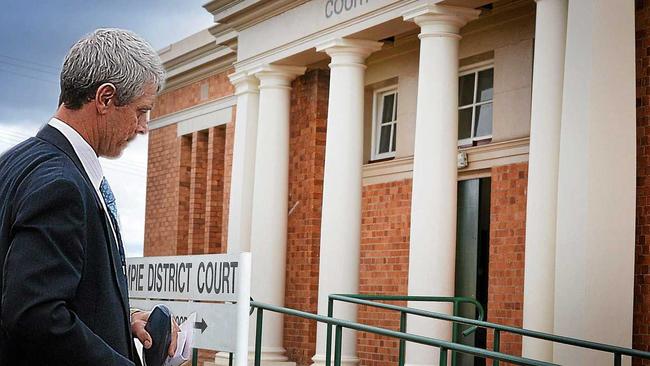 GUILTY: Peter Fitzgerald and the Gympie District Court, where he pleaded guilty today to assault occasioning bodily harm during a Gympie Pony Club event at his equestrian centre. Picture: Renee Albrecht