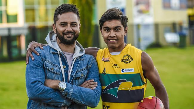 Port premiership player Peter Burgoyne, left, with eldest son Trent in 2018.