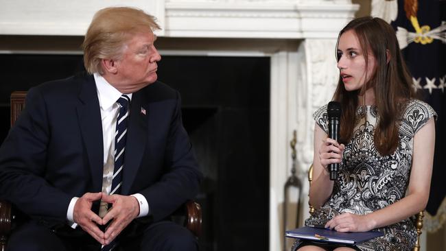 President Donald Trump hosted a ‘listening session’ at the White House, where he met survivors of the Florida massacre including student Carson Abt. Picture: AP