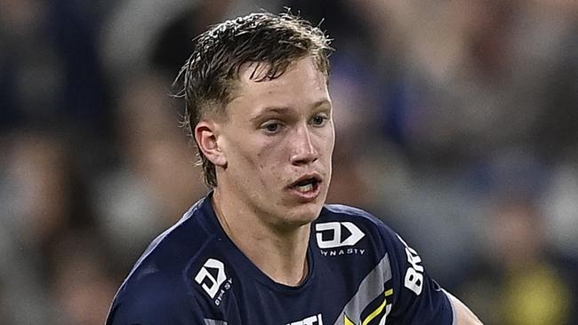 TOWNSVILLE, AUSTRALIA - JULY 21: Jaxon Purdue of the Cowboys runs the ball during the round 20 NRL match between North Queensland Cowboys and Canterbury Bulldogs at Qld Country Bank Stadium, on July 21, 2024, in Townsville, Australia. (Photo by Ian Hitchcock/Getty Images)