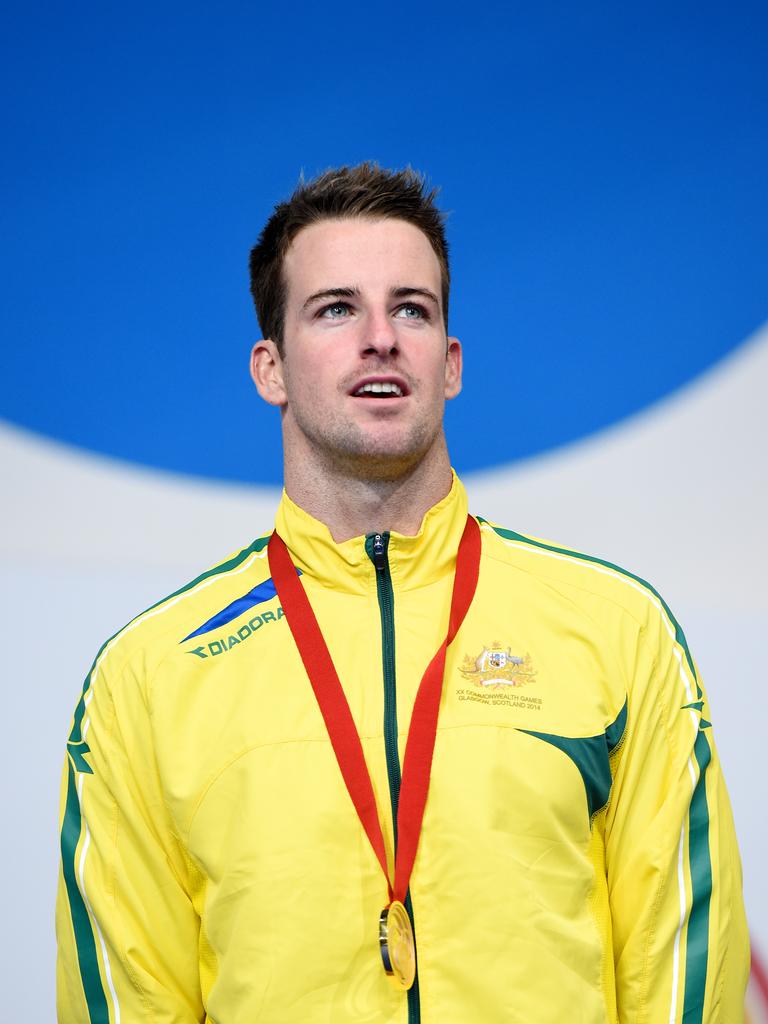 Swimmer James Magnussen with his 2014 Commonwealth Games gold medal for the men's 100m freestyle. Picture: AAP
