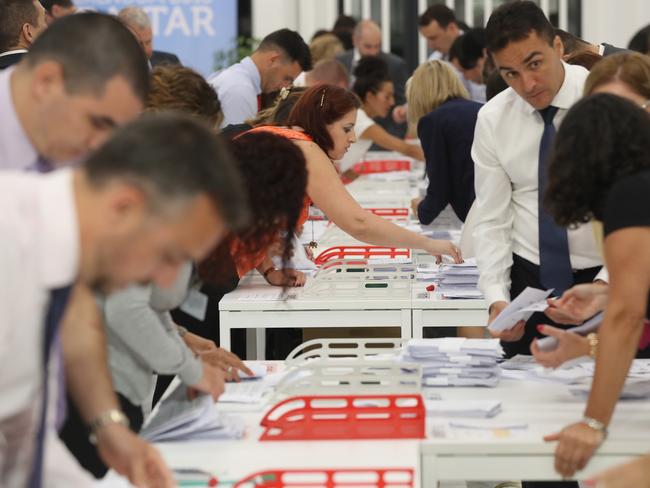 Referendum workers at Gibraltar University count ballots after the closing of polling stations an hour before mainland Britain.