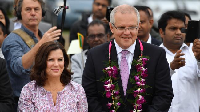 Scott Morrison and wife Jenny visit the Sakyamuni Sambuddha Vihara, Sri Lankan Buddhist Temple, in Berwick in Melbourne. Picture: AAP. 