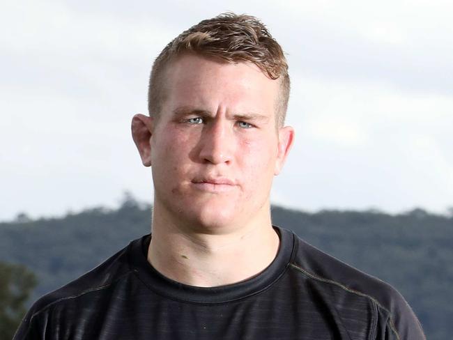 Penrith Panthers player Mitch Kenny pictured at the Panthers training ground with a lawnmower, Penrith, Sydney, 20th June 2019.  Mitch Kenny was a grounds keeper a few weeks back and is now with the Penrith Panthers.Picture by Damian Shaw