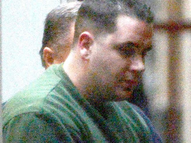 Reporter: Paddy Murphy has identified this pic as Gavin Perry , Supreme court...laneway arrivals (Second van, first of two prisoners,lower security ) Picture : Mike Keating.