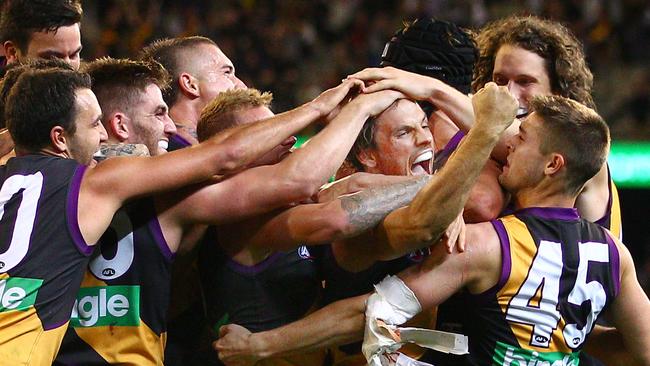 Sam Lloyd and the Tigers celebrate.