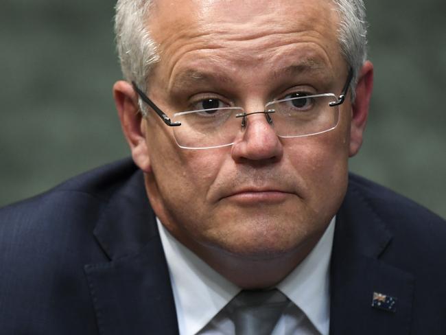 Australian Prime Minister Scott Morrison reacts during House of Representatives Question Time at Parliament House in Canberra, Wednesday, November 27, 2019. (AAP Image/Lukas Coch) NO ARCHIVING