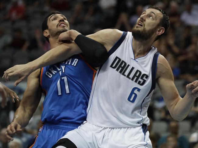 DALLAS, TX - OCTOBER 11: Enes Kanter #11 of the Oklahoma City Thunder and Andrew Bogut #6 of the Dallas Mavericks battle during a preseason game at American Airlines Center on October 11, 2016 in Dallas, Texas. (Photo by Ronald Martinez/Getty Images)