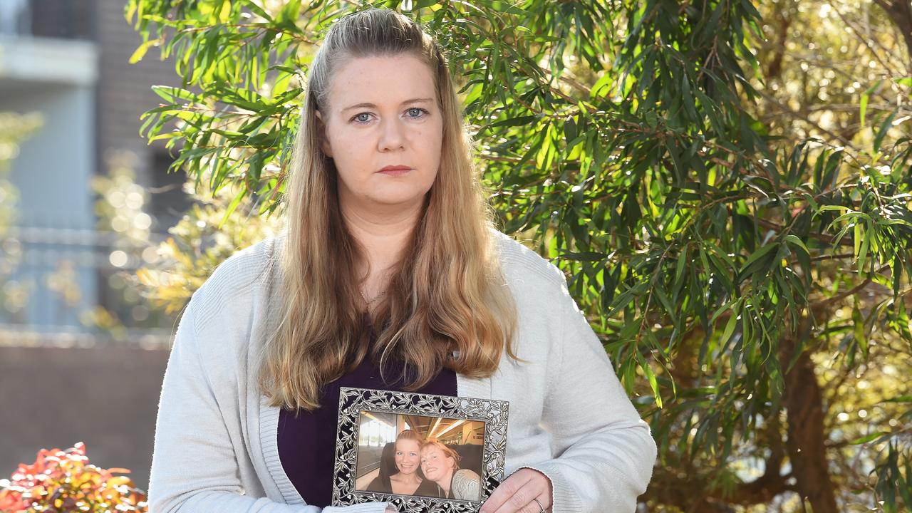 Sarah Baum with a photo of her sister, Jacinta, who died days after being discharged from a Geelong psychiatric unit. Picture: Josie Hayden