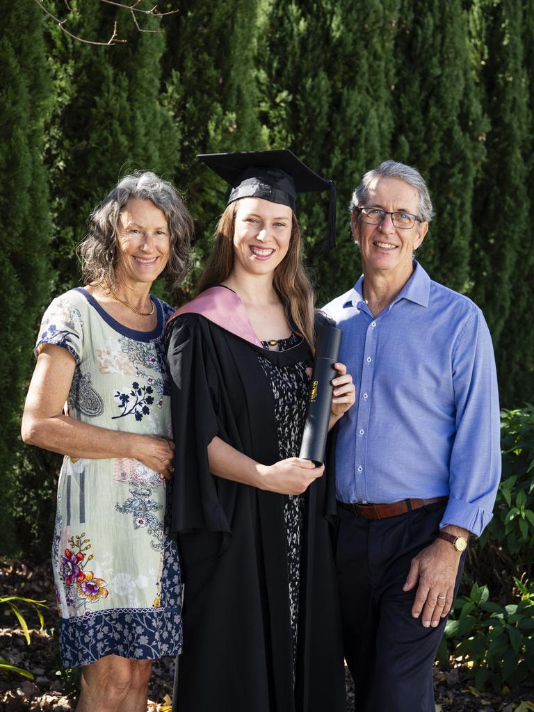 Bachelor of Education (Primary) graduate Sarah Hummerston is congratulated by parents Janet and Bruce Hummerston at a UniSQ graduation ceremony at Empire Theatres, Tuesday, June 27, 2023. Picture: Kevin Farmer