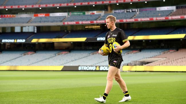 Jack Riewoldt walks on the MCG in front of no fans before Round 1. Picture: Getty