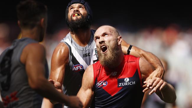 Paddy Ryder of the Power and Max Gawn of the Demons contest the ruck.