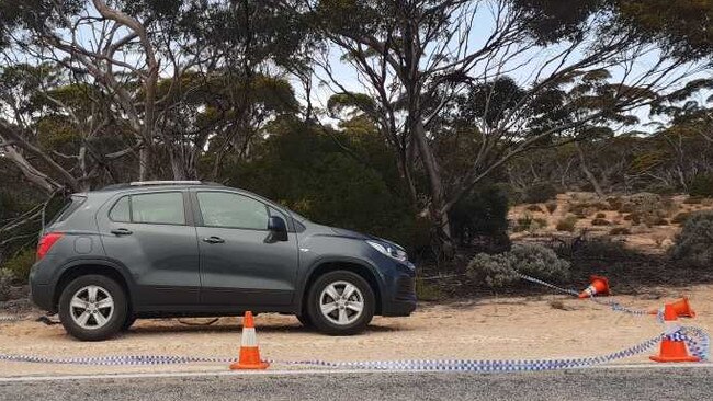 A car on the side of the Eyre Highway near Nundroo, which police have declared a crime scene in the search for a missing man in SA's Far West. Picture: SA Police