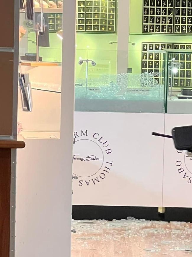 Smashed glass at the store. Picture: Facebook