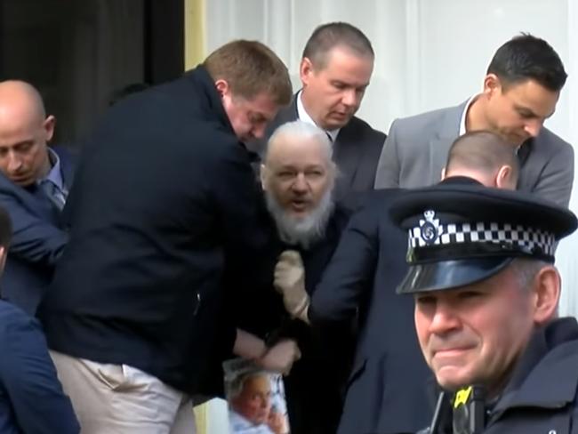 Julian Assange is arrested and carried out of the Ecuadorean Embassy in central London. Credit Ruptly