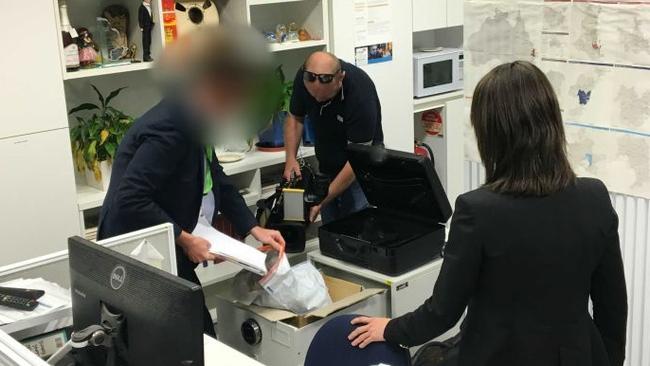 ASIO secures cabinet files at an ABC office. Picture: ABC News