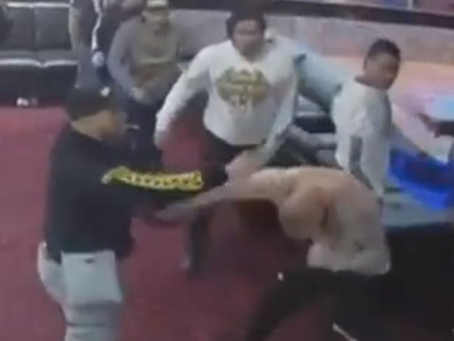 Members dressed in Commanchero jackets and jumpers threw wild punches during the brawl. Picture: Channel 7