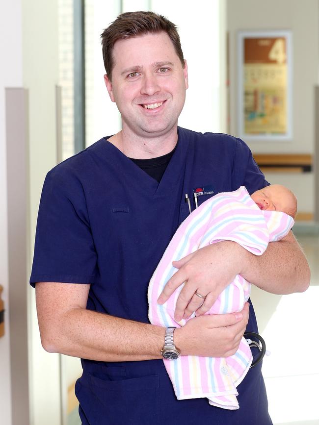 Peter Barry with baby Maggie Sanson. Picture: Tim Hunter.