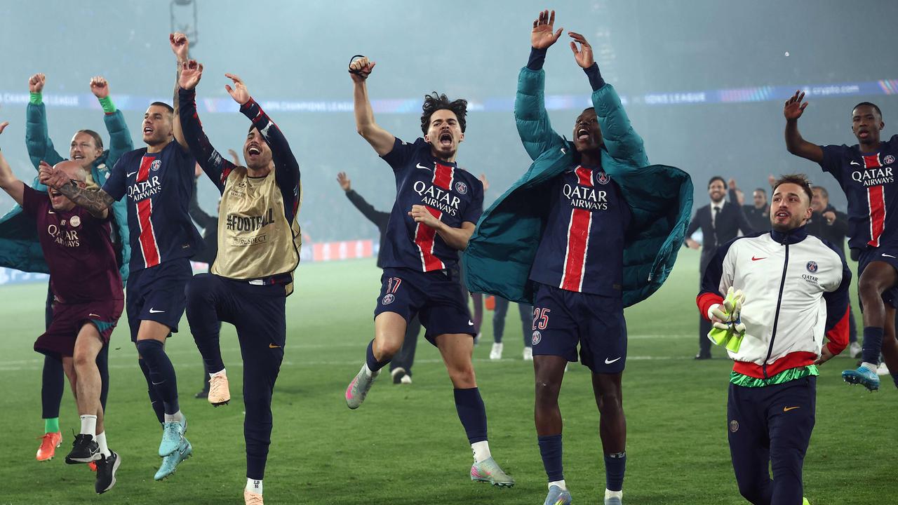 PSG's players celebrate their victory at the end of the UEFA Champions League semi-final second leg. (Photo by FRANCK FIFE / AFP)