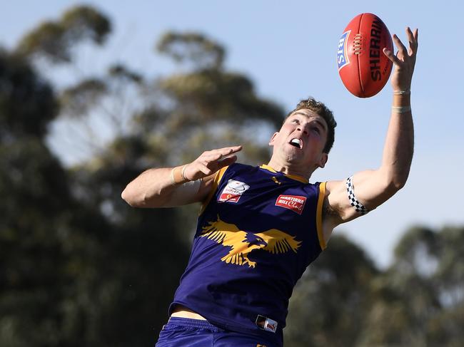 Brett Eddy takes a mark over Dylan Marshall during the EFL Div 1 Grand final between Vermont and South Croydon in Bayswater, Saturday, Sept. 22, 2018. Picture:Andy Brownbill