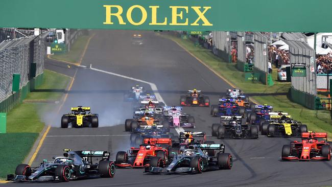 Mercedes’ Finnish driver Valtteri Bottas (L) leading the pack at the start of the Australian Grand Prix in Melbourne in 2019.