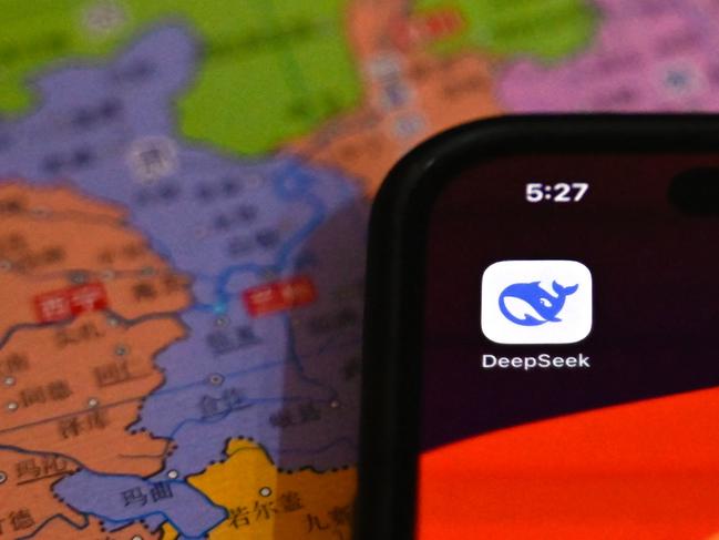 TOPSHOT - This photo illustration shows the DeepSeek app on a mobile phone in Beijing on January 28, 2025. Fears of upheaval in the AI gold rush rocked Wall Street, following the emergence of a popular ChatGPT-like model from China, with US President Donald Trump saying it was a "wake-up call" for Silicon Valley. (Photo by Pedro PARDO / AFP)