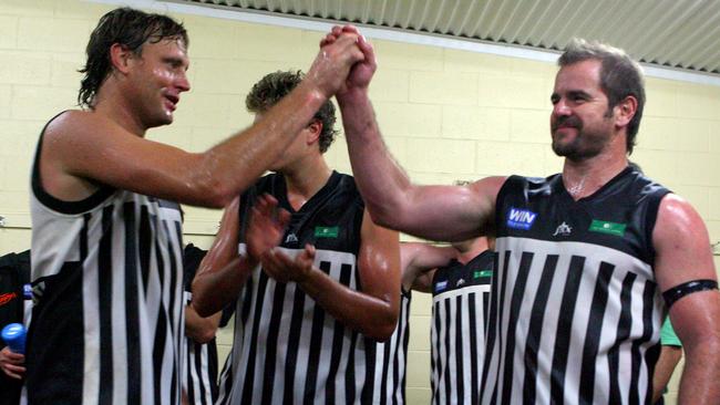 Brooke Hoad celebrates a win with ex-Adelaide Crows captain Mark Ricciuto in 2008. It was Hoad’s 200th game for Waikerie with Ricciuto returning to his hometown club.