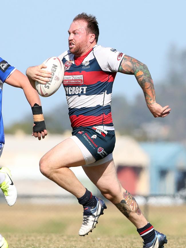 Gold Coast Bulletin only Please check with Picture Editor before use. Gold Coast Rugby League preliminary final between Tugun and Runaway Bay. Photo of Jamie Anderson scoring a try. Photo by Richard Gosling