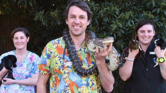 Number 3: The Unusual Pet Vets, vet Michelle Sutherland, vet James Haberfield with a Centralian carpet python and nurse Erin Haslam. Picture: Josie Hayden