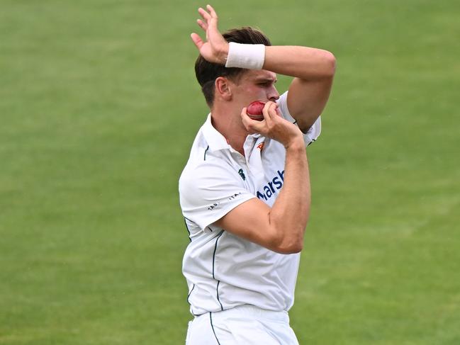 HOBART, AUSTRALIA - MARCH 03: Iain Carlisle of the Tigers bowls during the Sheffield Shield match between Tasmania and Victoria at Blundstone Arena, on March 03, 2024, in Hobart, Australia. (Photo by Steve Bell/Getty Images)