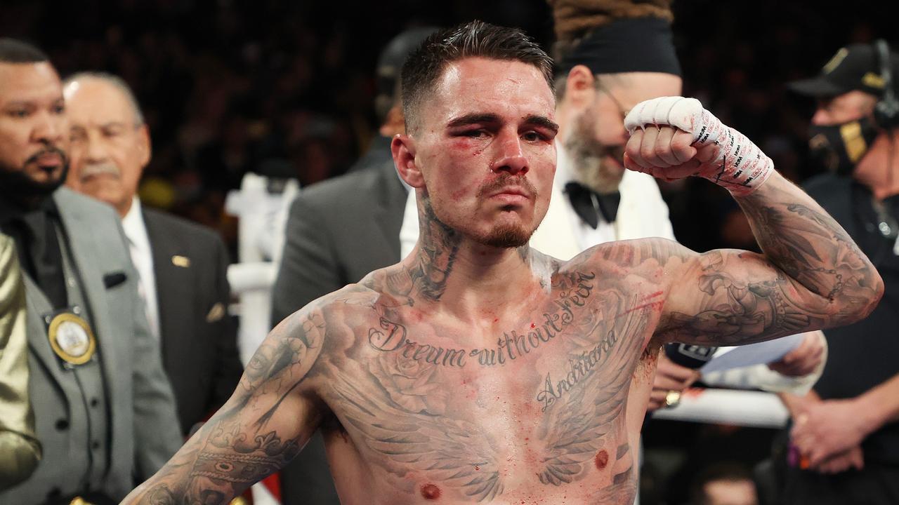 NEW YORK, NEW YORK - NOVEMBER 27: George Kambosos celebrates his split decision win against Teofimo Lopez after their championship bout for LopezÃ¢â&#130;¬â&#132;¢s Undisputed Lightweight title at The Hulu Theater at Madison Square Garden on November 27, 2021 in New York, New York. (Photo by Al Bello/Getty Images)