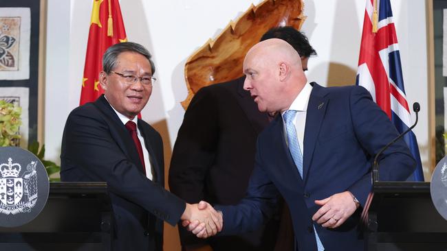 Li Qiang and New Zealand Prime Minister Christopher Luxon shake hands in Wellington, the first stop on the Chinese Premier’s Tasman tour. Picture: Getty Images