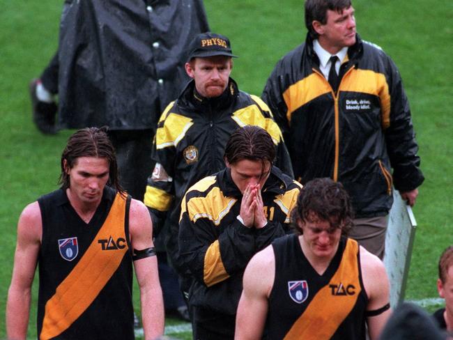 Richmond players leave the field after their 1995 preliminary final loss to Geelong.