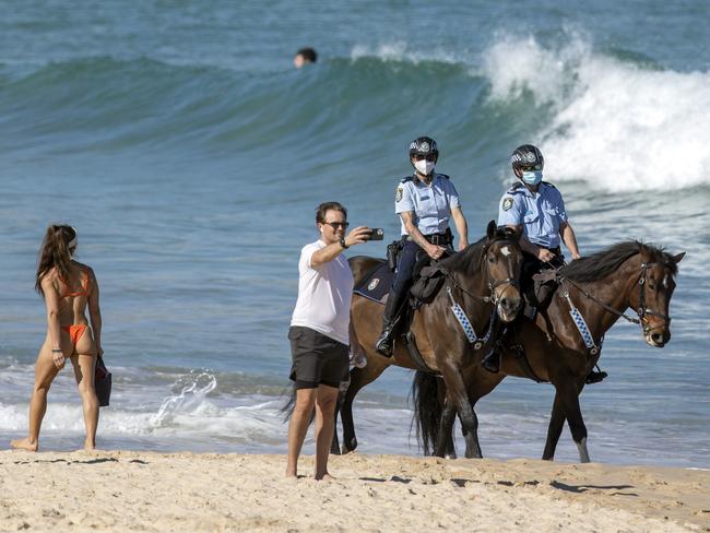 16-08-21NSW Mounted Police pictured at Bondi Beach 14 hours after the commencement of ÃOperation Stay at HomeÃ.