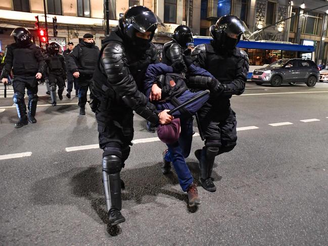 Police officers detain demonstrators in Saint Petersburg. Picture: AFP