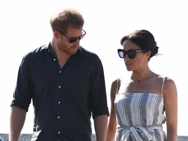 Fraser Island Royal Visit - Harry and Meghan on Kingfisher Bay jetty.