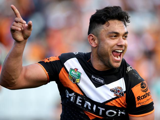 Tigers David Nofoaluma celebrates a try against the at Campbelltown Stadium. Stump up $330,100 and he’s yours. Picture: Gregg Porteous