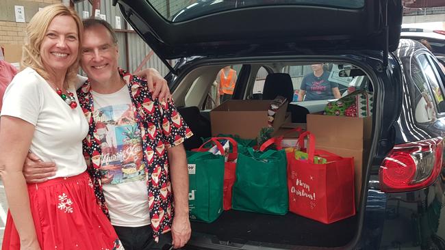 Jennifer and Ruthven Underhill with their car full of donations. Photo: Jennifer Underhill