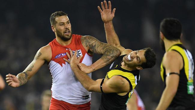 Lance Franklin and Alex Rance get acquainted.