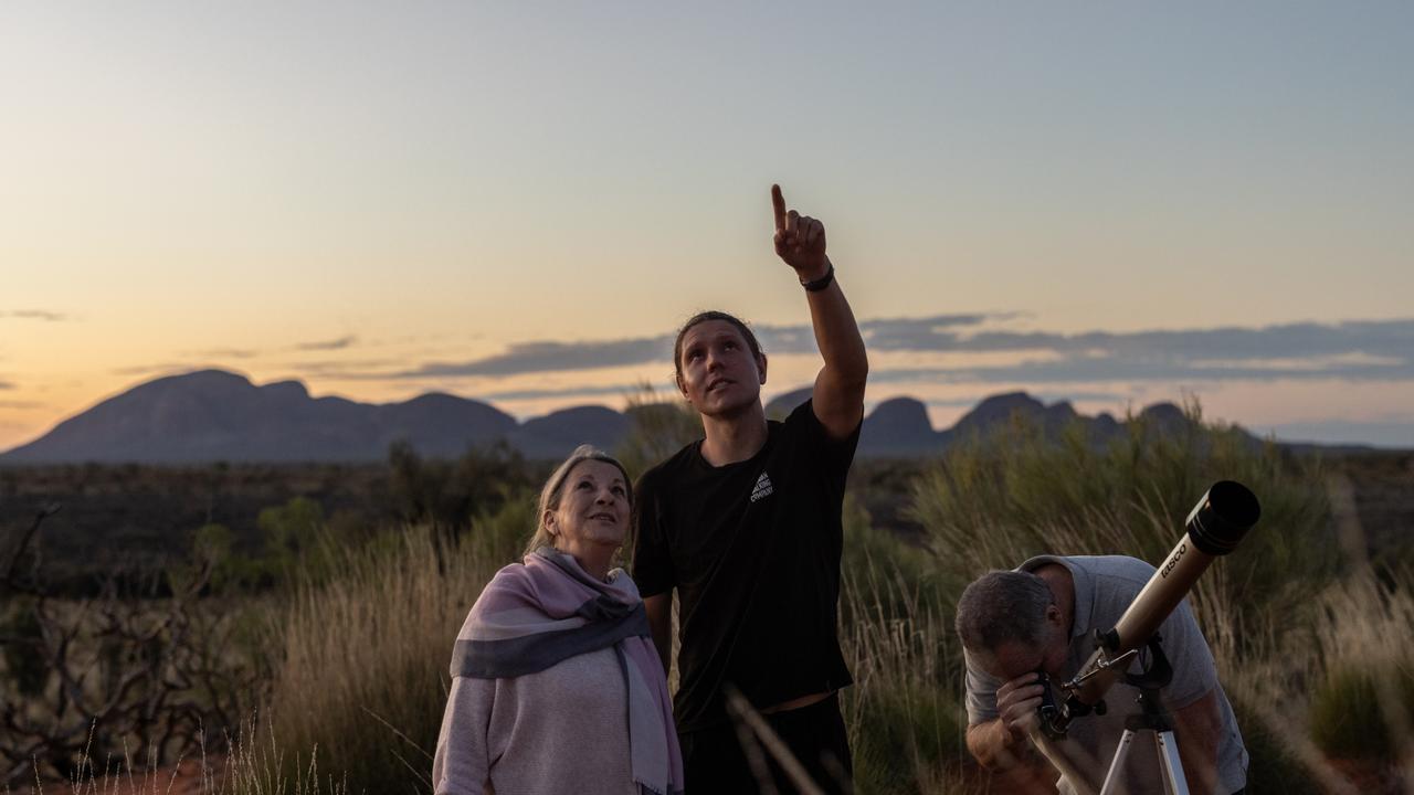 Walkers stargazing at the Uluru-Kata Tjuta National Park. Picture: Helen Orr.