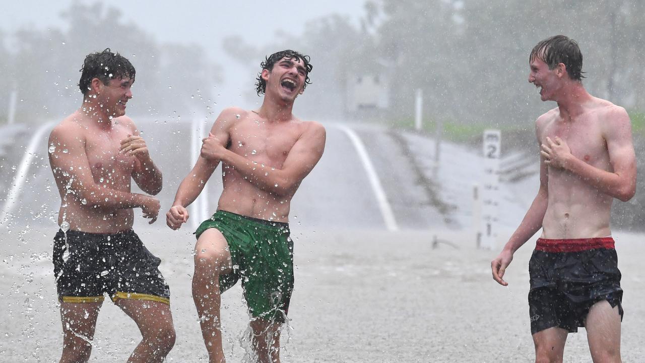 Wet weather in Townsville. Road closed at Allambie Lane, Kelso. Aston Smith, Mitchell Maher and Riley McIntyre. Picture: Evan Morgan