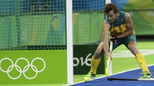 Australia's Jacob Whetton scores against Great Britain to help the Kookaburras progress