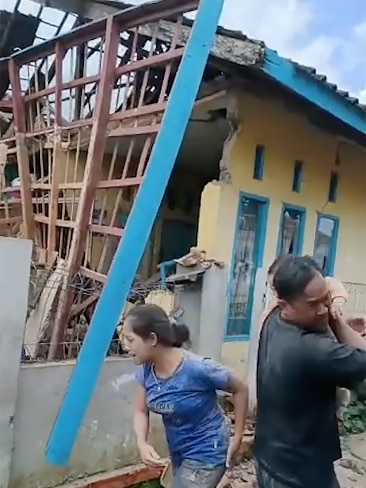 Residents poured out of homes with children in their hands after the tremor struck on Monday afternoon. Picture: Indonesian National Agency Disaster Counter / Handout/Anadolu Agency via Getty